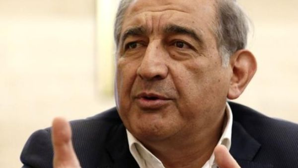 Syria's deputy PM Qadri Jamil was fired from office Tuesday for meeting with US representatives this past weekend to discuss the proposed Geneva peace talks to end the conflict in Syria (AP)