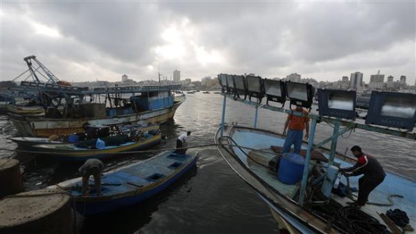  Palestinian fishermen at the port of Gaza City (AFP/File Photo)