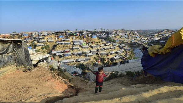 A Rohingya refugee child climbs stairs at Hakimpara refugee camp in Bangladesh's Ukhia district on Jan. 27, 2018 (AFP)
