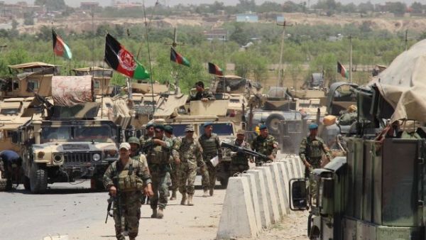 Afghan troops walk in the Chardarah district of Kunduz province on June 21, 2015. (AFP/File)