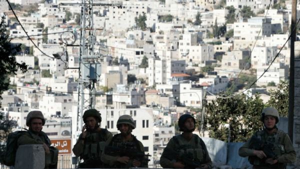 Israeli security forces have tightened access to the West Bank town of Hebron (AFP/File Photo)