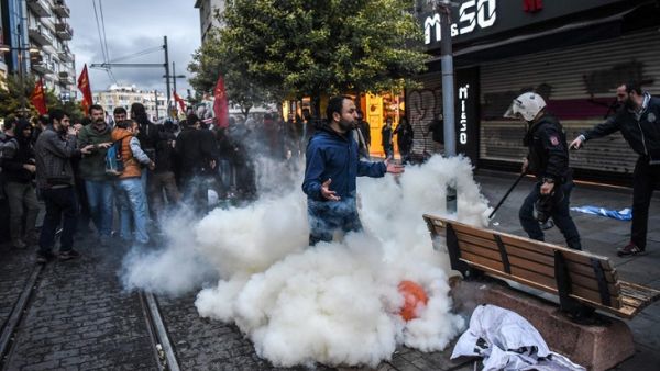 Demonstrators clash with riot police in Turkey's capital, Istanbul. (AFP)
