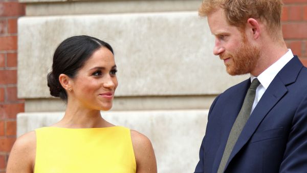 Britain's Prince Harry, Duke of Sussex and Britain's Meghan, Duchess of Sussex arrive to attend a reception marking the culmination of the Commonwealth Secretariats Youth Leadership Workshop. (AFP)