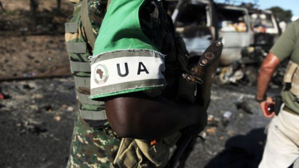An African Union soldier patrols the scene of an al-Shabaab attack in Mogadishu in 2014. (AFP/Mohamed Abdiwahab)