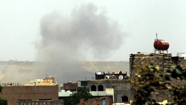 Smoke rises above the military academy in the Yemeni capital Sanaa on April 11, 2015, following an alleged air strike by the Saudi-led alliance on Shiite Houthi rebels camps. (AFP/File)