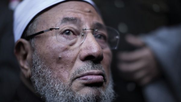 القرضاوي يبلغ من العمر 90 عاما وحكم عليه بالإعدام غيابيا في عهد عبد الفتاح السيسي - أرشيف