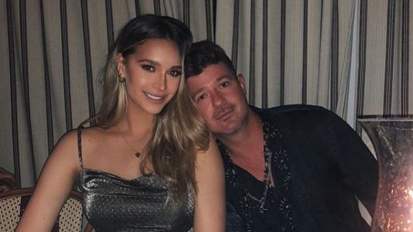 روبين ثييك وزوجته أبريل لوف غيري