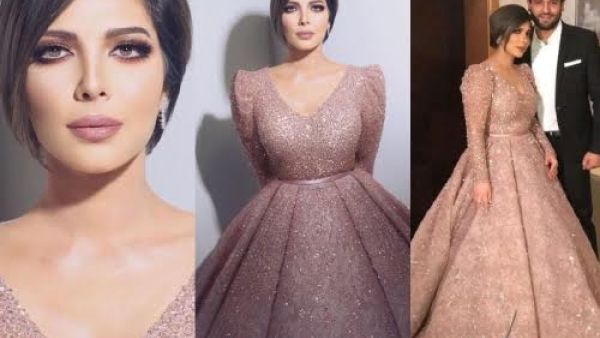 تألقت أصالة نصري بفستان زهري اللون من توقيع يوسف الجسمي