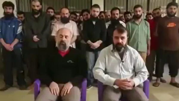 تطرّق العقيد نضال، إلى قضية نجاح مساعي النظام السوري بإطلاق مقاتلين شيعة، في مقابل الإهمال الذي عوملوا به