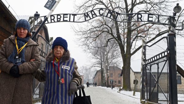 A former concentration camp prisoner at the memorial site of the former Nazi concentration camp Auschwitz-Birkenau in Oswiecim (AFP/File Photo)