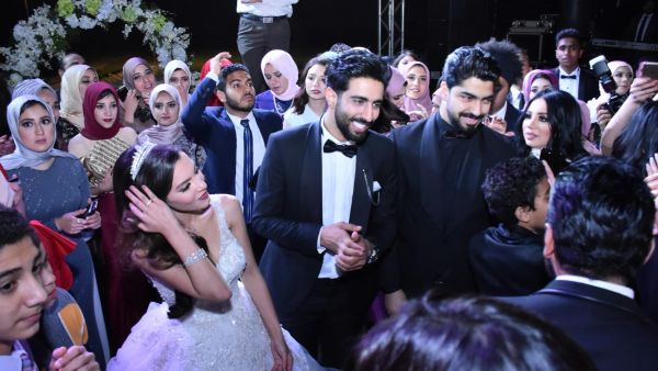 The happy couple on their wedding day. (Youm 7)