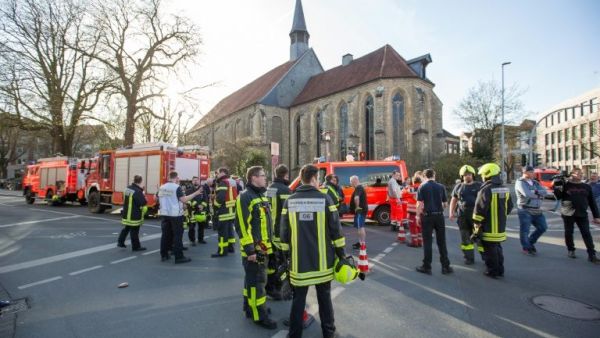Fireman in place where several people were killed and injured when a car ploughs into pedestrians in Münster, Germany (AFP/File Photo)	