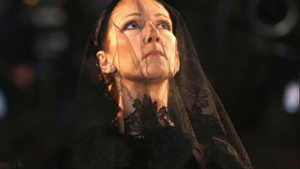 Celine Dion at her husband's funeral. (AFP)