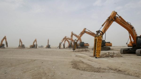 The Athens-based company was awarded $335 million to reconstruct part of the Doha industrial area. (AFP/File) The Athens-based company was awarded $335 million to reconstruct part of the Doha industrial area. (AFP/File)