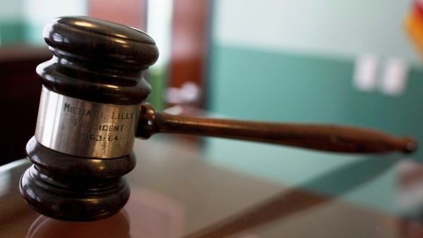 Arrest warrants are out for those suspected of participating in the militant organizations. (Shutterstock)