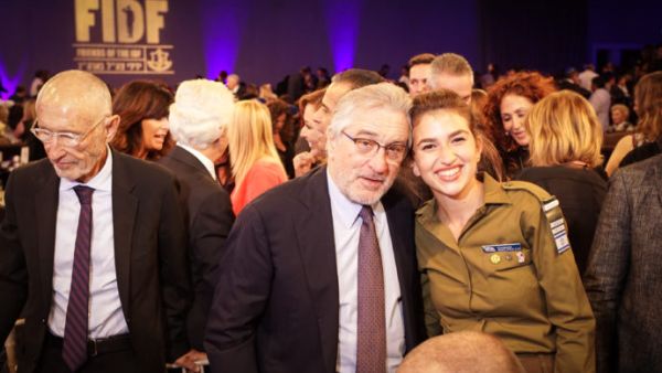 Robert De Niro and an Israeli soldier. (Photo Credit: Justin Kenderes)