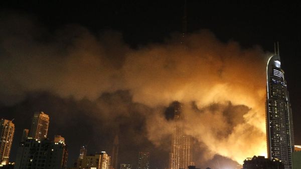 A building in Dubai burns, AFP/File
