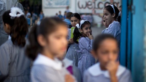 Egypt announced a new strategy in the way the country invests in education, with new sources of funding that would allow partnerships with the private sector. (AFP photo)