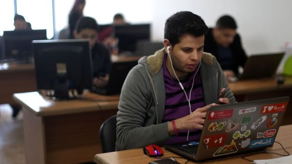 Launched by philanthropist businessmen, the fund aims to revamp the Palestinian education system in an initiative that could ultimately be expanded across the entire Arab world. (AFP/ Mahmud Hams)