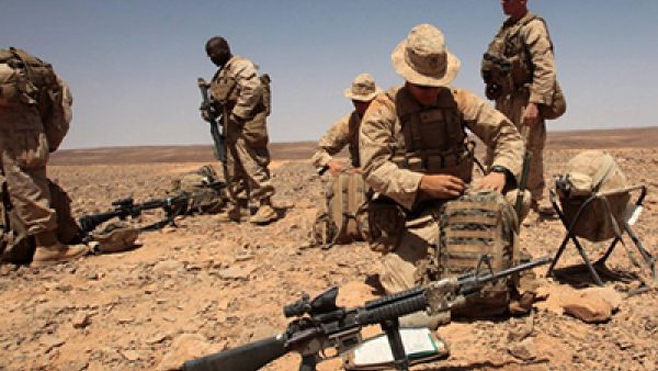US soldiers prepare their gear during the military exercise near the Jordanian border. (AFP/File)
