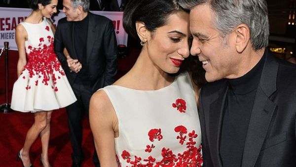 George has hinted he will retire in the UK after admitting he can imagine getting"old and grey" in his and wife Amal's south east England home. (File photo)