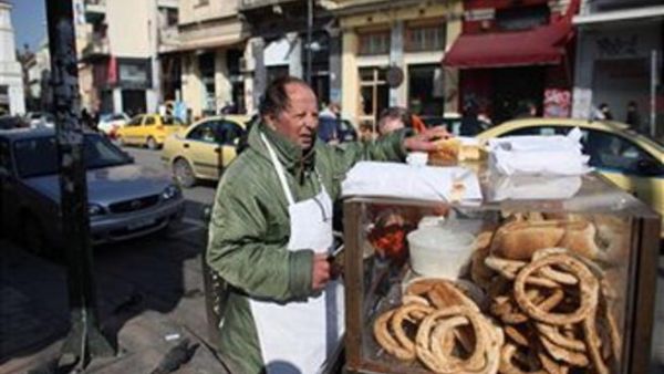 Once 15 Syrian pounds a bag of bread, now sold at some 100 Syrian pounds