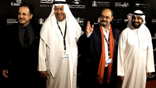 Kuwaiti Producer and film maker Walid al-Awadi (L), actors Saad al-Faraj (2nd L) and Khaled Ameen (R) pose during the photocall of "Tora Bora" movie in the opening ceremony of the Gulf Film Festival in Dubai on April 10, 2012. (AFP)