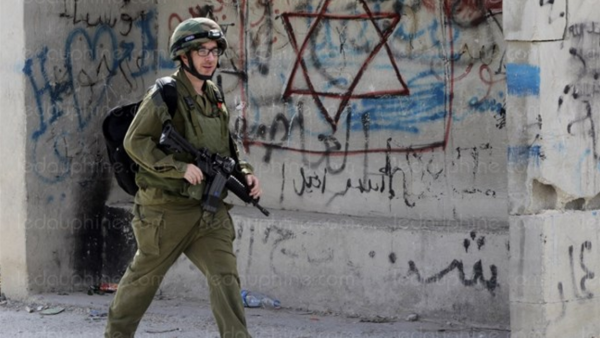 An Israeli soldier in Hebron. (AFP photo) 