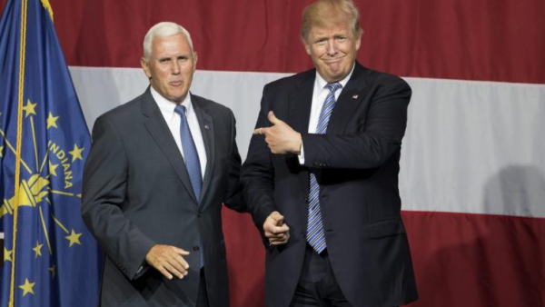 Indiana Governor Mike Pence, on left. (Photo: TASOS KATOPODIS/AFP/GETTY IMAGES)