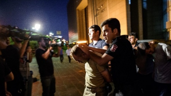 Turkish police arrest soldiers after the failed rebellion July 15. (photo: AFP)