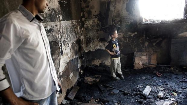 The Dawabshe home in Duma, West Bank is pictured after being firebombed, killing three. (AFP)