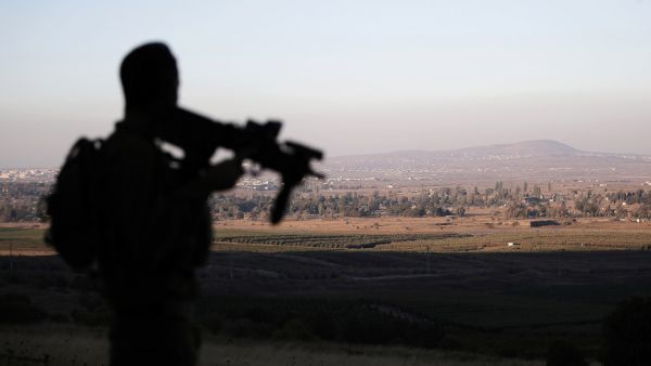 An Israeli soldier is stationed near the Israeli-Syrian border, August 2015.  (AFP/File)