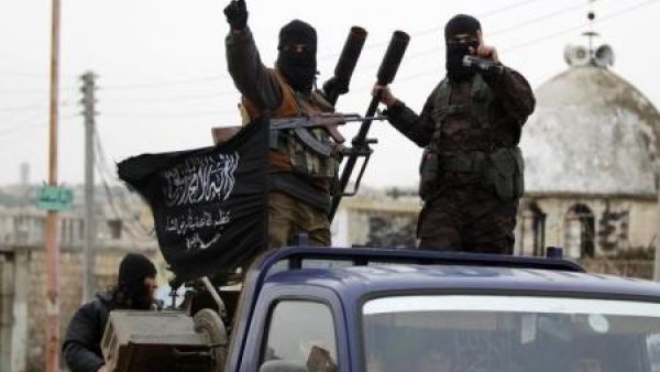 Nusra Front militants flying their flag in the Idlib province. (AFP/File)