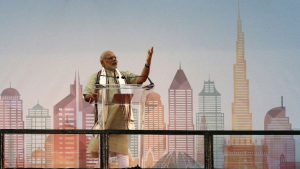 Modi delivers a speech to members of the Indian expatriate community at the Dubai Cricket Stadium, on Aug. 17, 2015. (AFP/Karim Sahib)