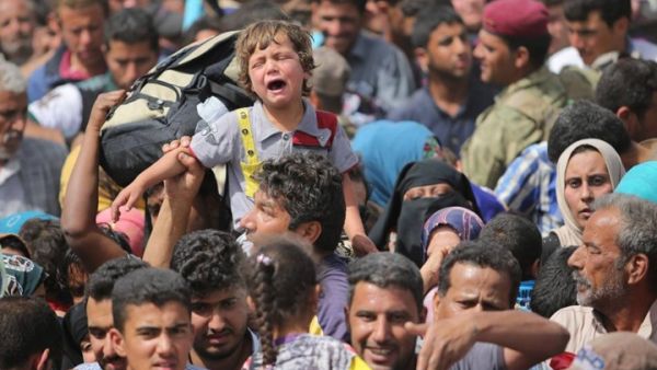 تعكف الأمم المتحدة في محيط الموصل، على أكبر عملية إغاثة هذا العام - أرشيف