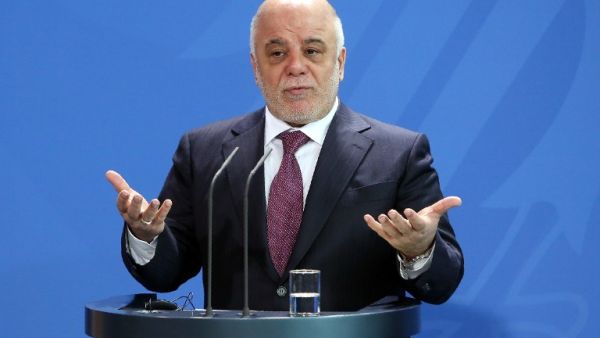 Iraqi Prime Minister Haider al-Abadi speaks at a joint press conference with German Chancellor after their meeting at the Chancellery in Berlin on February 11, 2016. (AFP/Adam Berry)