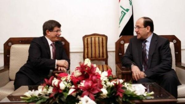 اوغلو خلال لقائه مع المالكي