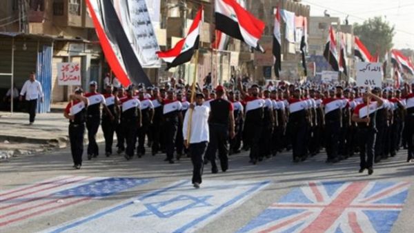 على وقع هتافي "كلا كلا امريكا" و"كلا كلا اسرائيل" سار الآلاف من مؤيدي الزعيم الشيعي الشاب وسط مدينة الصدر