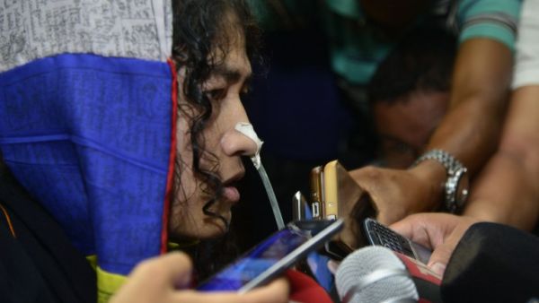 Indian rights activist Irom Sharmila talks to media after appearing before a District and Sessions Judge at Imphal West court in Imphal on August 9, 2016. (AFP/Biju Boro)