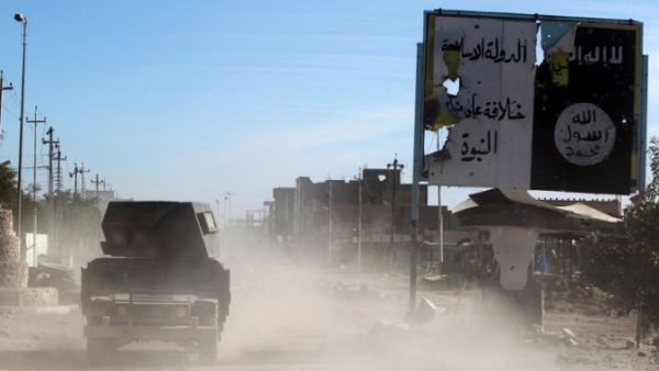 Members of the Iraqi army are seen entering the Ramadi suburbs earlier this month. (AFP/Ahmad Al-Rubaye)