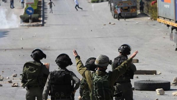 The Palestinian medics rushed to the scene where a youth had been hit by a military jeep. Image used for illustrative purposes. (AFP/File) The Palestinian medics rushed to the scene where a youth had been hit by a military jeep. Image used for illustrative purposes. (AFP/File)
