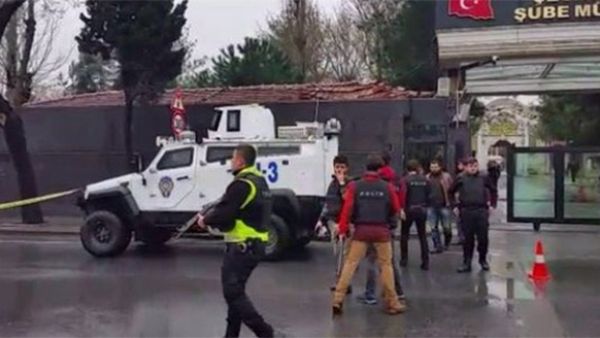 Riot police patrol outside a police station in the Bayrampasha district of Istanbul after two militants launched an attack on the building. (Twitter/Mete Sohtaoglu)