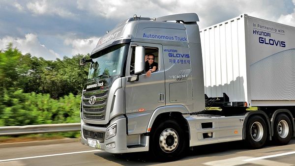 The semi-trailer truck is approximately 3.5 times longer, 1.4 times wider, and 9.2 times heavier than the average compact sedan, when compared with the weight of an empty truck. 
