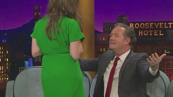 Mayim Bialik struggles between Jewish faith and modesty as she flashes Piers Morgan. (Mix1073.com)