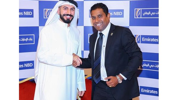 سيف حسن الشامسي، شريك في شركة شروق للأسهم والسندات و ديبتا بريماسينقا رئيس قسم التقاص العام في بنك الإمارات دبي الوطني