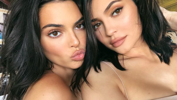 Kendall shared a slideshow on Instagram of herself and Kylie posing for the camera (Source: kyliejenner / Instagram )