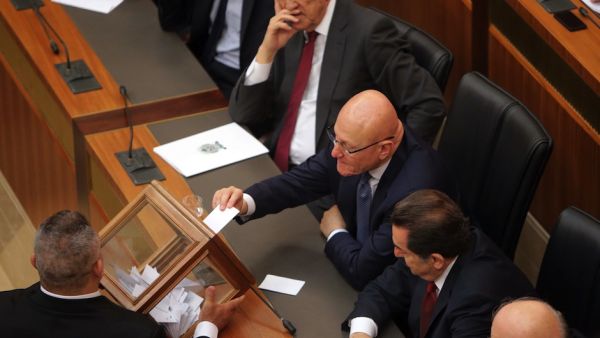 Lebanese MPs seen casting ballots in a parliamentary session. (AFP/File)
