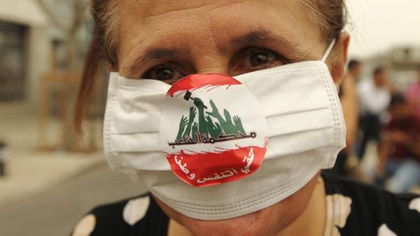 An activist attends a demonstration in Beirut against government inaction on Lebanon's growing garbage crisis, September 2015. (AFP/Anwar Amro) 