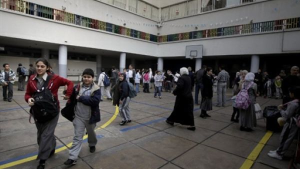 طلبة مدارس يغادرون مدارسهم خشية من توتر الوضع/أ.ف.ب