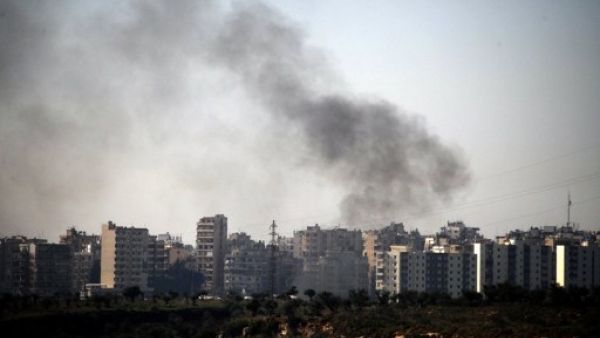 دخان يتصاعد من منطقة الاشتباكات/أ.ف.ب